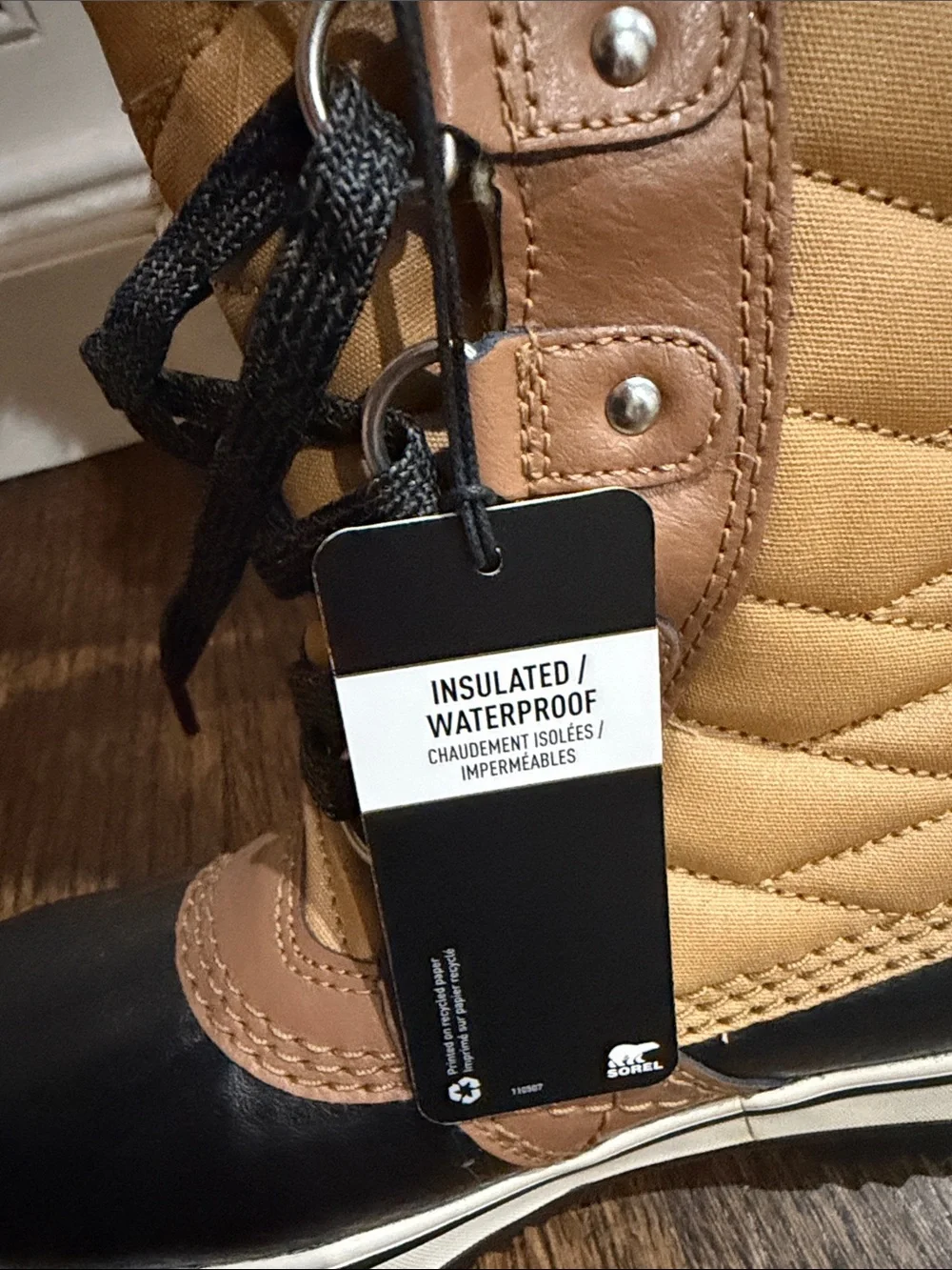 Sorel Kids Lace-Up Winter Boots in Black and Tan with Cream Faux Fur